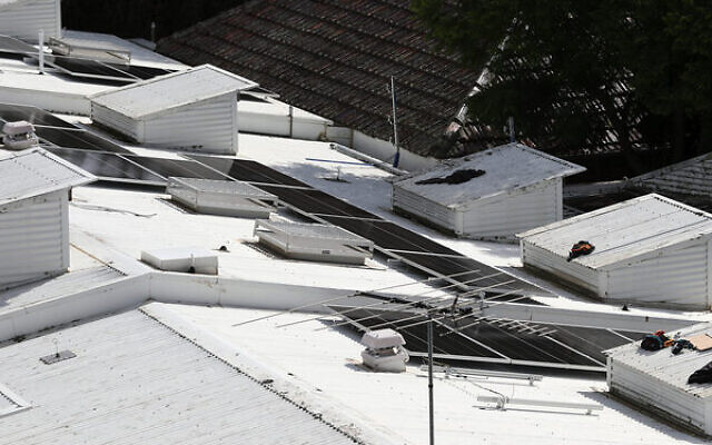 New solar panels being installed at Beth Weizmann Community Centre. Photo: Peter Haskin New solar panels being installed at Beth Weizmann Community Centre. Photo: Peter Haskin