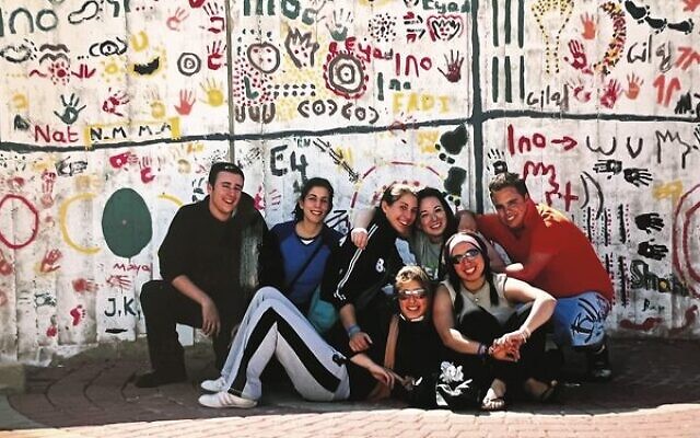 Volunteering in Shlomi. The IBC volunteer group helped the local children paint murals on the wall in town. Volunteering in Shlomi. The IBC volunteer group helped the local children paint murals on the wall in town.