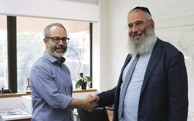 Errol Jacobson (left) with Jewish House CEO Rabbi Mendel Kastel. Errol Jacobson (left) with Jewish House CEO Rabbi Mendel Kastel.