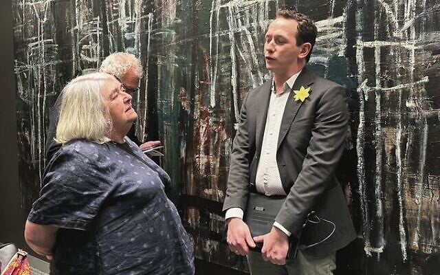 Michal Majewski (right), wearing a paper daffodil memorialising Shoah victims, gives genealogy advice at the Melbourne Holocaust Museum.
Photo: Peter Kohn Michal Majewski (right), wearing a paper daffodil memorialising Shoah victims, gives genealogy advice at the Melbourne Holocaust Museum.
Photo: Peter Kohn