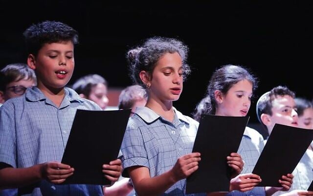 Year 5 and 6 students from Sholem Aleichem College sing the Partisan Song during the Yom Hashoah event at Glen Eira Town Hall. Photo: Peter Haskin Year 5 and 6 students from Sholem Aleichem College sing the Partisan Song during the Yom Hashoah event at Glen Eira Town Hall. Photo: Peter Haskin