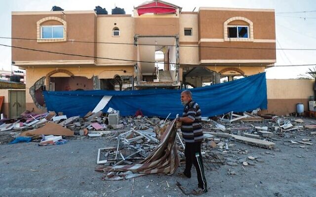 A man inspects the damaged house of terrorist Jihad Ghannam, killed in an Israeli airstrike in Rafah on May 9. Photo: Said Khatib/AFP A man inspects the damaged house of terrorist Jihad Ghannam, killed in an Israeli airstrike in Rafah on May 9. Photo: Said Khatib/AFP