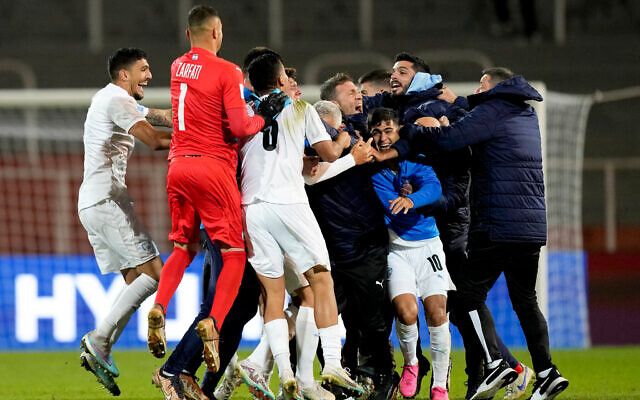 Israel's team celebrates winning 2-1 against Japan at the end of a FIFA U-20 World Cup Group C soccer match at the Malvinas Argentinas stadium in Mendoza, Argentina, May 27, 2023. Photo: AP Photo/Natacha Pisarenko Israel's team celebrates winning 2-1 against Japan at the end of a FIFA U-20 World Cup Group C soccer match at the Malvinas Argentinas stadium in Mendoza, Argentina, May 27, 2023. Photo: AP Photo/Natacha Pisarenko