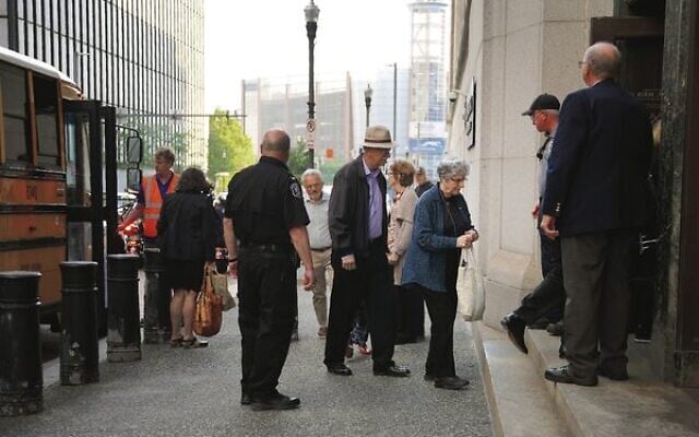 Members of Pittsburgh's Jewish community enter the federal courthouse in Pittsburgh for the first day of the trial. Photo: AP Photo/Jessie Wardarski Members of Pittsburgh's Jewish community enter the federal courthouse in Pittsburgh for the first day of the trial. Photo: AP Photo/Jessie Wardarski
