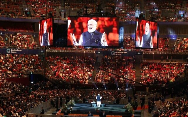 Indian Prime Minister Narendra Modi addresses the crowd at Qudos Bank Arena at Sydney's Olympic Park. Indian Prime Minister Narendra Modi addresses the crowd at Qudos Bank Arena at Sydney's Olympic Park.
