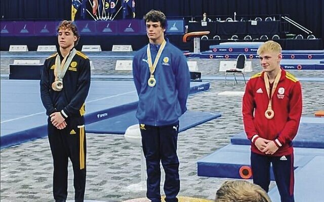 Uri Lev (centre) on the podium after winning a vault final. Uri Lev (centre) on the podium after winning a vault final.