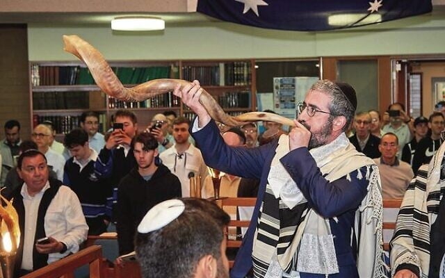 Rabbi Yaakov Glasman blowing the shofar. Photo: Paul Topol. Rabbi Yaakov Glasman blowing the shofar. Photo: Paul Topol.