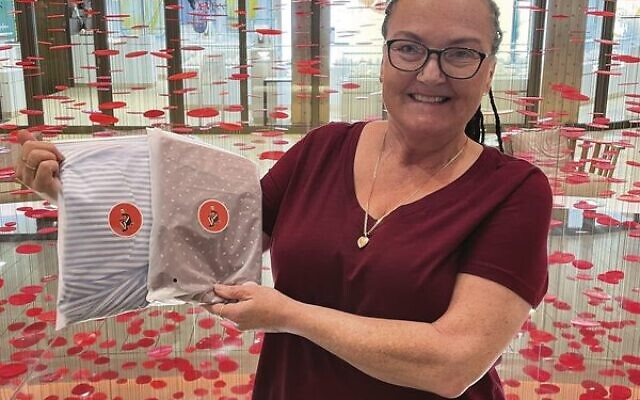 Sharon Noetzel holding a few pairs of Mikey's Shorts. Sharon Noetzel holding a few pairs of Mikey's Shorts.