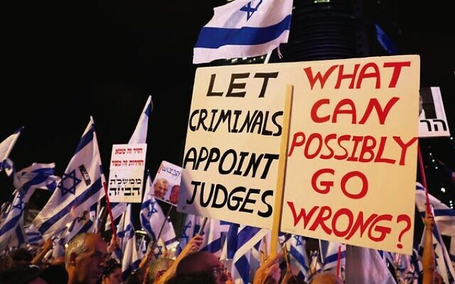 Israelis protest the government's judicial reform plans in Tel Aviv on June 10.
Photo: Jack Guez/AFP Israelis protest the government's judicial reform plans in Tel Aviv on June 10.
Photo: Jack Guez/AFP