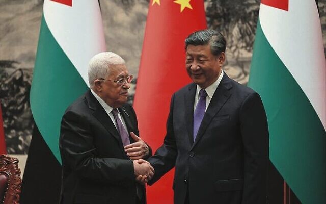 Mahmoud Abbas (left) shakes hands with China's President Xi Jinping in Beijing on June 14.
Photo: Jade Gao/Pool/AFP Mahmoud Abbas (left) shakes hands with China's President Xi Jinping in Beijing on June 14.
Photo: Jade Gao/Pool/AFP