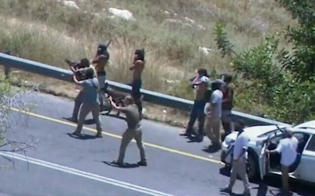 Settlers firing at the West Bank village of Umm Safa. Photo: Twitter video screenshot Settlers firing at the West Bank village of Umm Safa. Photo: Twitter video screenshot