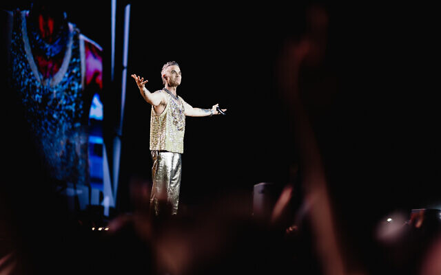 UK pop star Robbie Williams performs at Yarkon Park in Tel Aviv, June 1, 2023. Photo: Guy Sidi UK pop star Robbie Williams performs at Yarkon Park in Tel Aviv, June 1, 2023. Photo: Guy Sidi