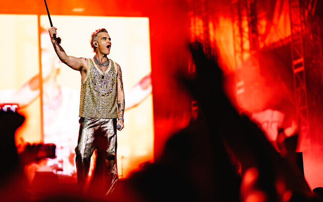 UK pop star Robbie Williams performs in Tel Aviv at Yarkon Park on June 1, 2023. Photo: Guy Sidi UK pop star Robbie Williams performs in Tel Aviv at Yarkon Park on June 1, 2023. Photo: Guy Sidi