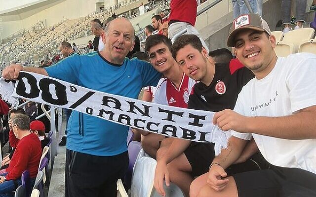 Danny Beran (left) enjoys a soccer match on his recent trip to Israel. Danny Beran (left) enjoys a soccer match on his recent trip to Israel.