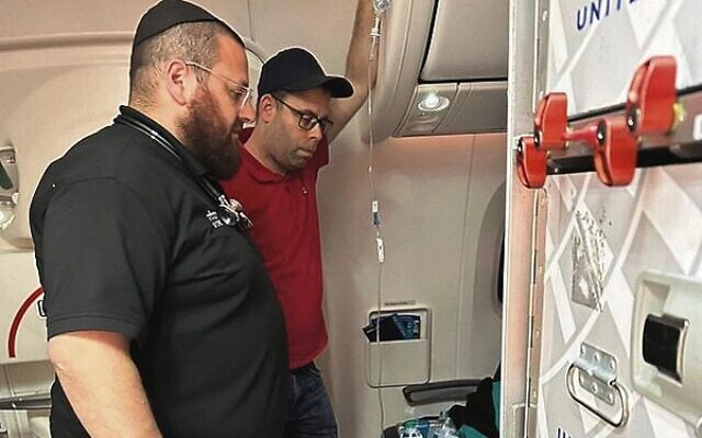 Hatzolah paramedics Mendy Litzman and David Platschek provided emergency medical assistance on a flight to Johannesburg. Hatzolah paramedics Mendy Litzman and David Platschek provided emergency medical assistance on a flight to Johannesburg.