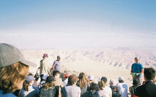 A tour guide enlightens Abi and her group on the Shvil Israel hike. A tour guide enlightens Abi and her group on the Shvil Israel hike.