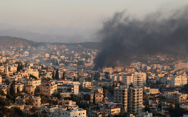 Smoke billows from houses inside the Jenin refugee camp in the northern West Bank city of Jenin on July 3, 2023, after an Israeli airstrike. Photo: Jaafar ASHTIYEH / AFP Smoke billows from houses inside the Jenin refugee camp in the northern West Bank city of Jenin on July 3, 2023, after an Israeli airstrike. Photo: Jaafar ASHTIYEH / AFP