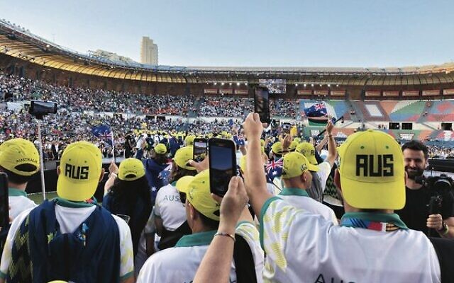 Team Australia members marching in the 2022 Maccabiah Games opening ceremony in Jerusalem's Teddy Stadium. Photo: Shane Desiatnik Team Australia members marching in the 2022 Maccabiah Games opening ceremony in Jerusalem's Teddy Stadium. Photo: Shane Desiatnik