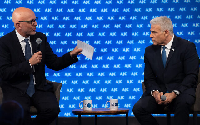 The CEO of the American Jewish Committee, Ted Deutch, left, interviews Israeli opposition leader Yair Lapid on June 11, 2023, in Tel Aviv, Israel. Photo: Courtesy AJC The CEO of the American Jewish Committee, Ted Deutch, left, interviews Israeli opposition leader Yair Lapid on June 11, 2023, in Tel Aviv, Israel. Photo: Courtesy AJC