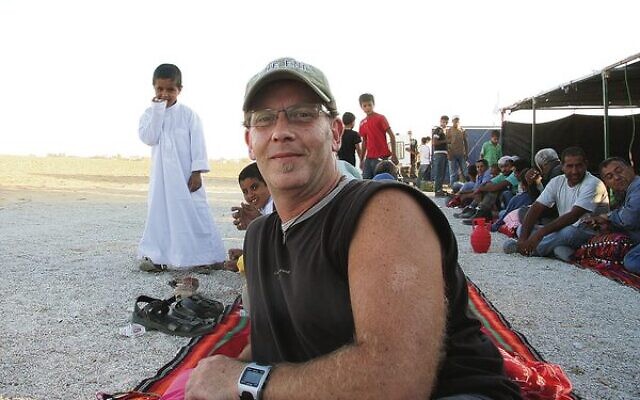 Peter Haskin enjoying Bedouin hospitality in Kuseife, near Beersheba. Peter Haskin enjoying Bedouin hospitality in Kuseife, near Beersheba.