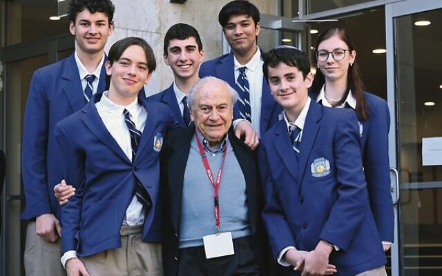 Holocaust survivor Richard Haber with Masada College students, from left: (back) Levi Walker, Ari Siganos, Aarush Gupta, Sasha Korchemnaia; (front) Eli Michaelis, Ethan Lander. Holocaust survivor Richard Haber with Masada College students, from left: (back) Levi Walker, Ari Siganos, Aarush Gupta, Sasha Korchemnaia; (front) Eli Michaelis, Ethan Lander.