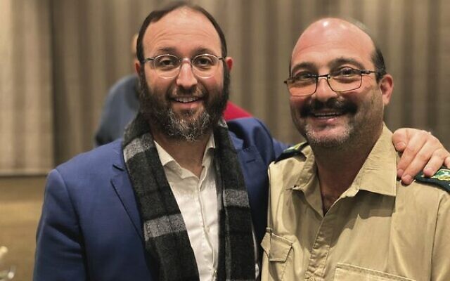 Rabbi Daniel Rabin (left) with South African ranger Sean Rubenstein. Rabbi Daniel Rabin (left) with South African ranger Sean Rubenstein.