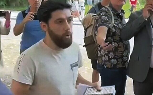 The activist outside the Israeli embassy in Sweden, where he had been granted permission to burn a Torah. Photo: Screen capture The activist outside the Israeli embassy in Sweden, where he had been granted permission to burn a Torah. Photo: Screen capture
