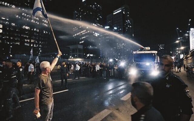Udi Uri protesting in Tel Aviv. Photo: Supplied Udi Uri protesting in Tel Aviv. Photo: Supplied