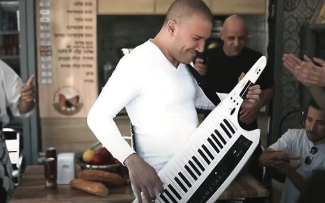 Performers dance in the video for the song Omelette Bread in Netanya. Photo: screenshot from YouTube Performers dance in the video for the song Omelette Bread in Netanya. Photo: screenshot from YouTube