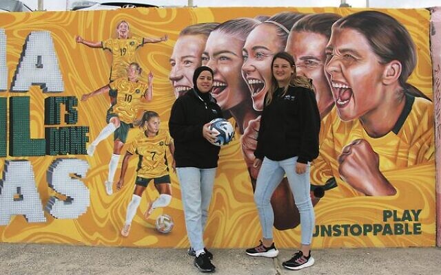 Deema Al-Rahmi (left) and Hadas Prawer pictured in front of the Matildas mural at Bondi Beach. Deema Al-Rahmi (left) and Hadas Prawer pictured in front of the Matildas mural at Bondi Beach.
