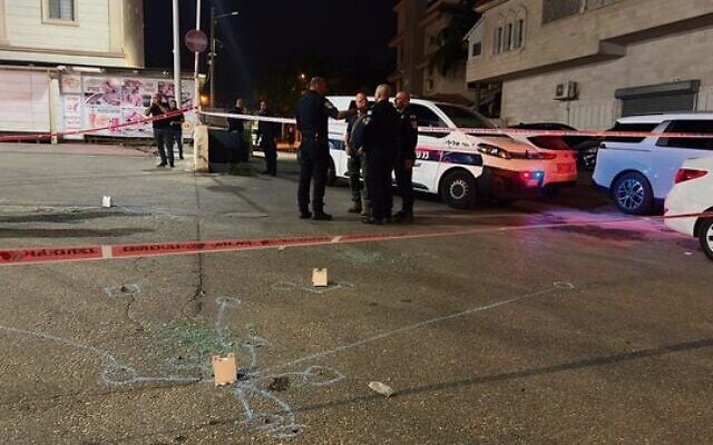 Police at the scene of a shooting in the central Arab city of Tira.
Photo: Israel Police Police at the scene of a shooting in the central Arab city of Tira.
Photo: Israel Police