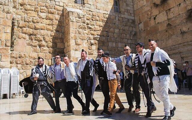 With the bar mitzvah boy, Yoni Bergman, at the Kotel. With the bar mitzvah boy, Yoni Bergman, at the Kotel.