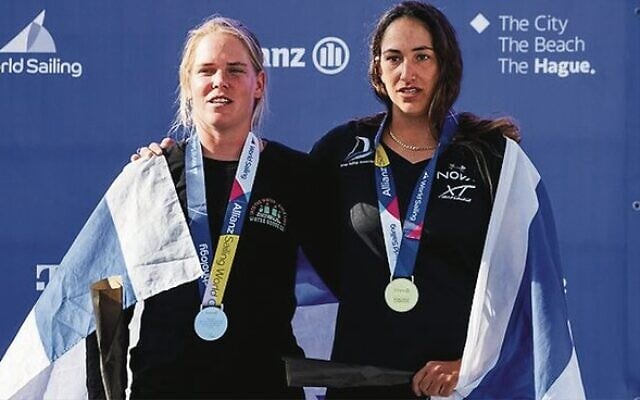 Israelis Katy Spychakov (left) and Shahar Tibi, wearing their medals at the 2023 Sailing World Championships last week.
Photo: Sailing Energy Israelis Katy Spychakov (left) and Shahar Tibi, wearing their medals at the 2023 Sailing World Championships last week.
Photo: Sailing Energy