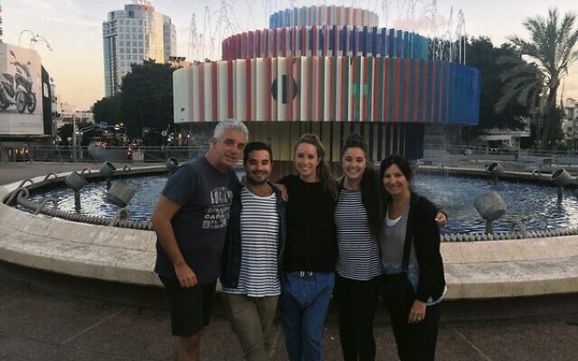 Lani with her husband and children in Dizengoff Square. Lani with her husband and children in Dizengoff Square.