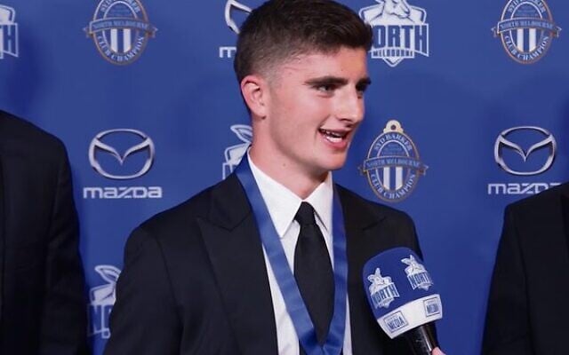 Harry Sheezel during his 2023 Syd Barker Medal acceptance speech. Harry Sheezel during his 2023 Syd Barker Medal acceptance speech.