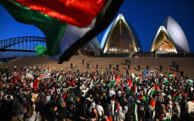 Participants of a Free Palestine rally react outside the Sydney Opera House in Sydney, Monday, October 9, 2023. Photo: AAP Image/Dean Lewins Participants of a Free Palestine rally react outside the Sydney Opera House in Sydney, Monday, October 9, 2023. Photo: AAP Image/Dean Lewins