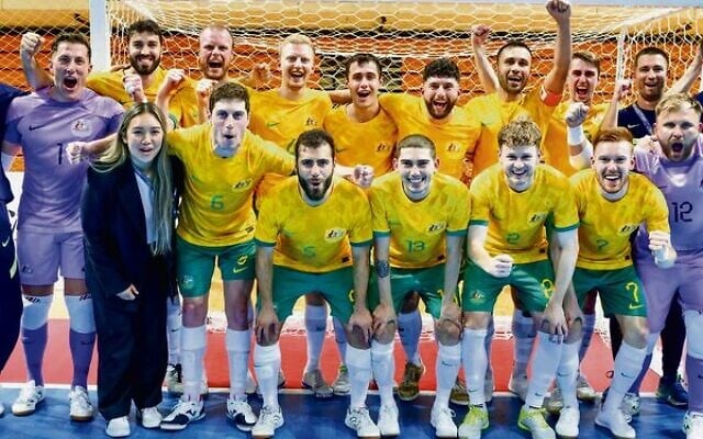 The Futsalroos celebrate in Chinese Taipei. Ethan De Melo is in the back row, fifth from the left. Photo: AFC Media The Futsalroos celebrate in Chinese Taipei. Ethan De Melo is in the back row, fifth from the left. Photo: AFC Media