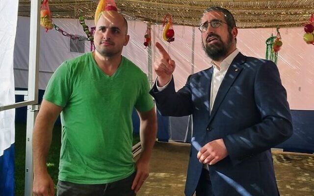 Maor Tirry admires St Kilda Shule's sukkah with Rabbi Yaakov Glasman. Maor Tirry admires St Kilda Shule's sukkah with Rabbi Yaakov Glasman.