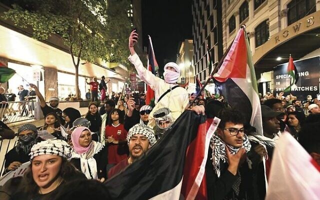 Pro-Palestinian protesters in Brisbane last month.
Photo: AAP Image/Darren England Pro-Palestinian protesters in Brisbane last month.
Photo: AAP Image/Darren England