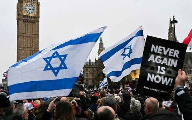 Protesters wave Israeli flags and hold placards in front of the UK Houses of Parliament in central London on November 26. Photo: Justin Tallis / AFP Protesters wave Israeli flags and hold placards in front of the UK Houses of Parliament in central London on November 26. Photo: Justin Tallis / AFP