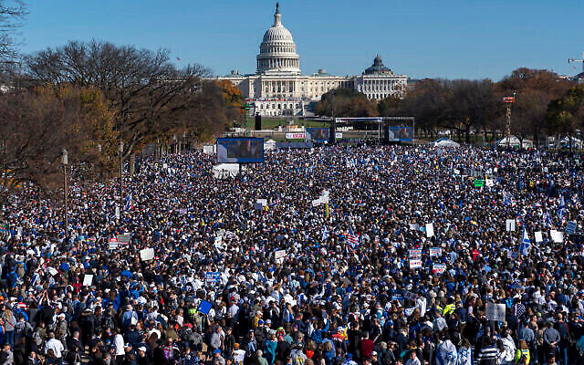 People attend the March for Israel rally November 14, 2023, on the National Mall in Washington. (The Times of Israel: AP Photo/Jacquelyn Martin) People attend the March for Israel rally November 14, 2023, on the National Mall in Washington. (The Times of Israel: AP Photo/Jacquelyn Martin)