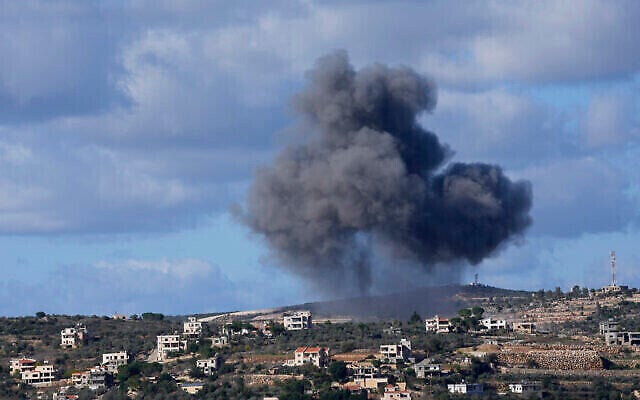 Illustrative: Black smoke rises from an Israeli airstrike on the outskirts of Aita al-Shaab, a Lebanese border village with Israel, as it is seen from Rmeish village in south Lebanon, Tuesday, Nov. 21, 2023 (The Times of Israel: AP Photo/Hussein Malla) Illustrative: Black smoke rises from an Israeli airstrike on the outskirts of Aita al-Shaab, a Lebanese border village with Israel, as it is seen from Rmeish village in south Lebanon, Tuesday, Nov. 21, 2023 (The Times of Israel: AP Photo/Hussein Malla)