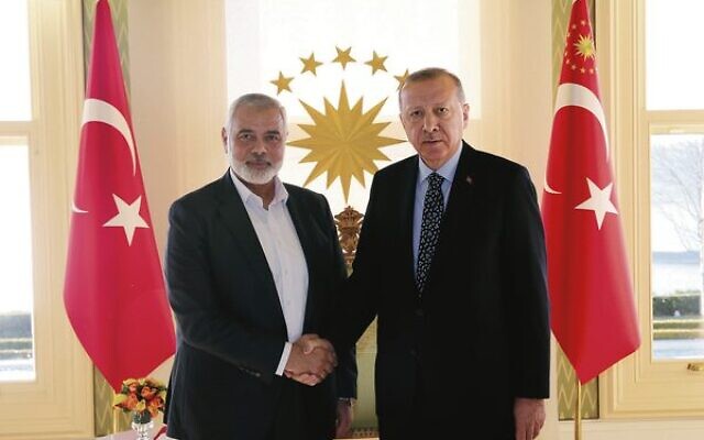 Turkish President Recep Tayyip Erdogan (right) shaking hands with Hamas chief Ismail Haniyeh in February 2020. Photo: Presidential Press Service via AP, Pool/ File Turkish President Recep Tayyip Erdogan (right) shaking hands with Hamas chief Ismail Haniyeh in February 2020. Photo: Presidential Press Service via AP, Pool/ File