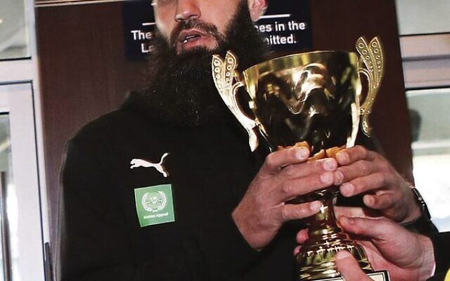 Bachar Houli holding the 2022 Jolson-Houli Cup. Photo: Peter Haskin Bachar Houli holding the 2022 Jolson-Houli Cup. Photo: Peter Haskin