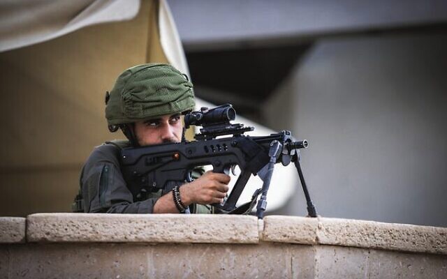 An Israeli soldier on patrol in the southern city of Sderot, October 11, 2023. Photo: Oren Ben Hakoon/Flash90 An Israeli soldier on patrol in the southern city of Sderot, October 11, 2023. Photo: Oren Ben Hakoon/Flash90