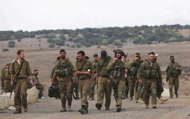 Israeli reserve soldiers in the Golan Heights on October 30.
Photo: David Cohen/Flash90 Israeli reserve soldiers in the Golan Heights on October 30.
Photo: David Cohen/Flash90