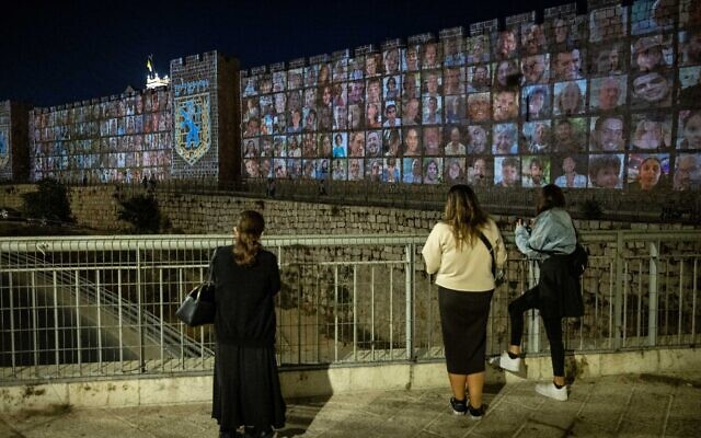 Pictures of Israelis abducted by Hamas terrorists in Gaza are screened on the walls of Jerusalem's Old City, on November 6, 2023. Photo: Yonatan Sindel/Flash90 Pictures of Israelis abducted by Hamas terrorists in Gaza are screened on the walls of Jerusalem's Old City, on November 6, 2023. Photo: Yonatan Sindel/Flash90