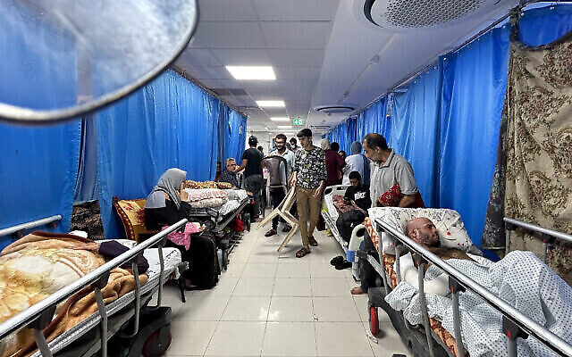 File: Palestinians seen at Al-Shifa Hospital in Gaza City, November 10, 2023. (The Times of Israel: Flash90) File: Palestinians seen at Al-Shifa Hospital in Gaza City, November 10, 2023. (The Times of Israel: Flash90)