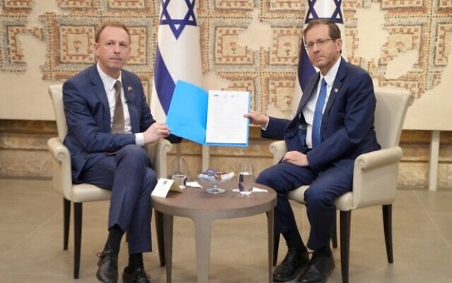 ZFA president Jeremy Leibler (left) presents the signed letter to Israeli President Isaac Herzog. Photo: Supplied ZFA president Jeremy Leibler (left) presents the signed letter to Israeli President Isaac Herzog. Photo: Supplied