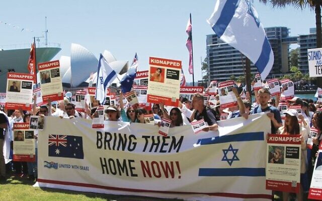 Demonstrators at First Fleet Park in Circular Quay on Sunday. Photo: Gareth Narunsky Demonstrators at First Fleet Park in Circular Quay on Sunday. Photo: Gareth Narunsky